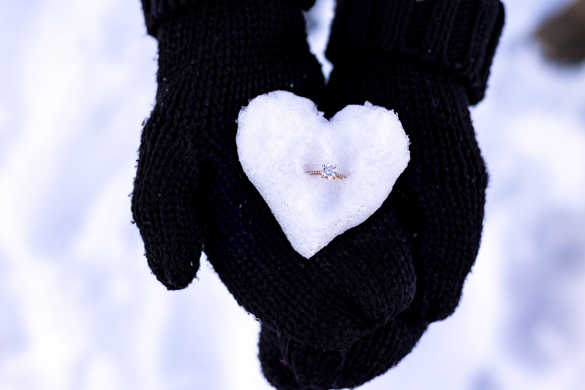 engagement-ring-in-snow-heart