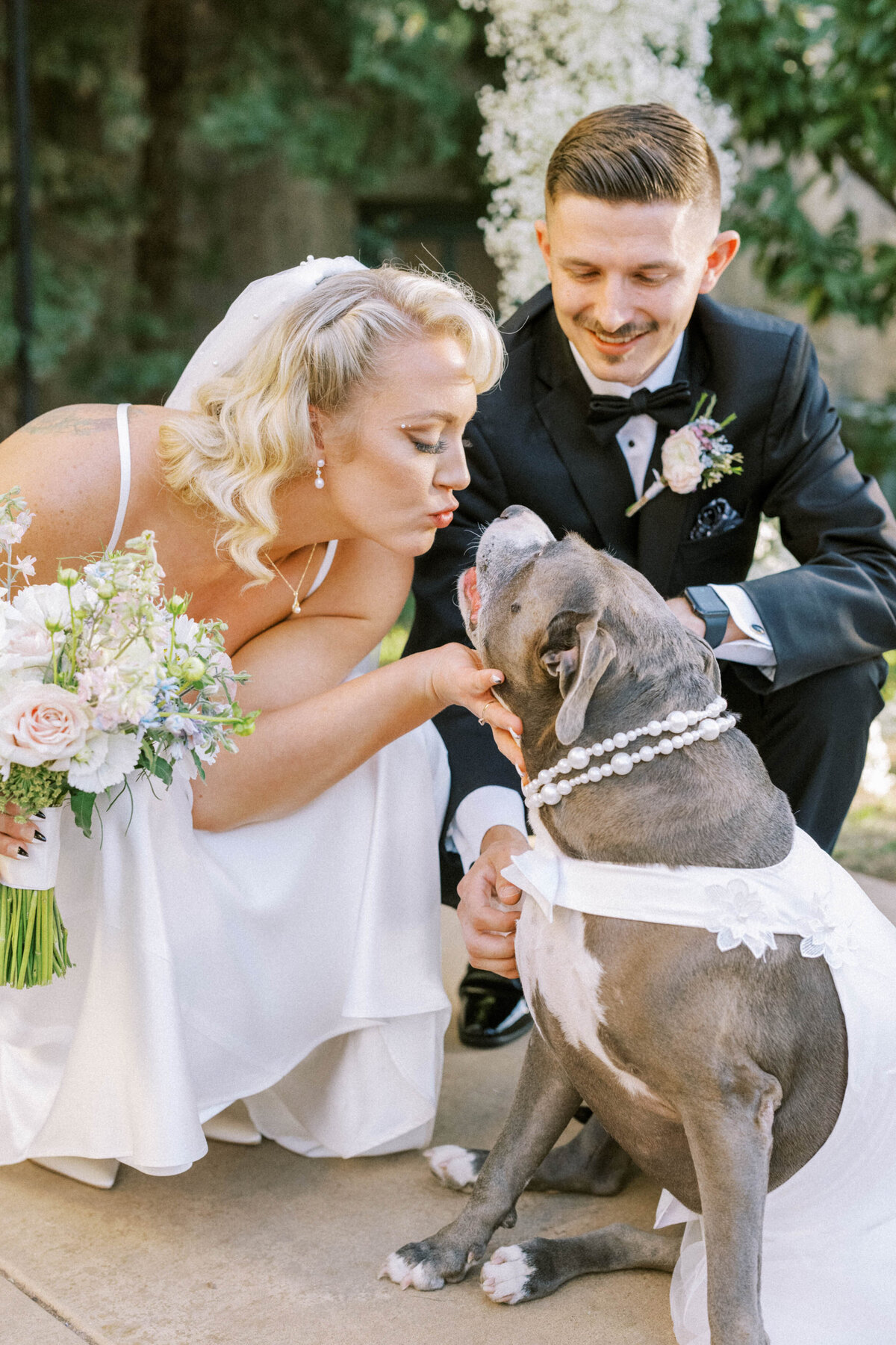 pitbull-flower-girl-kissing-bride