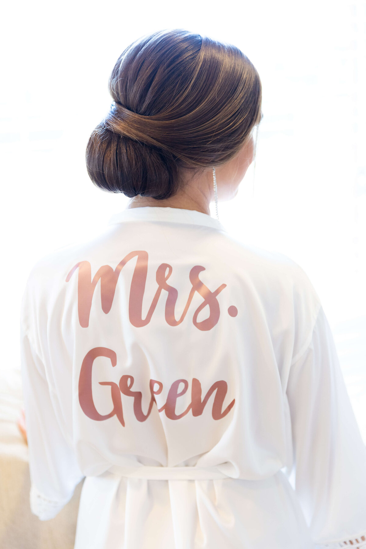 Bride wearing personalized silk gown
