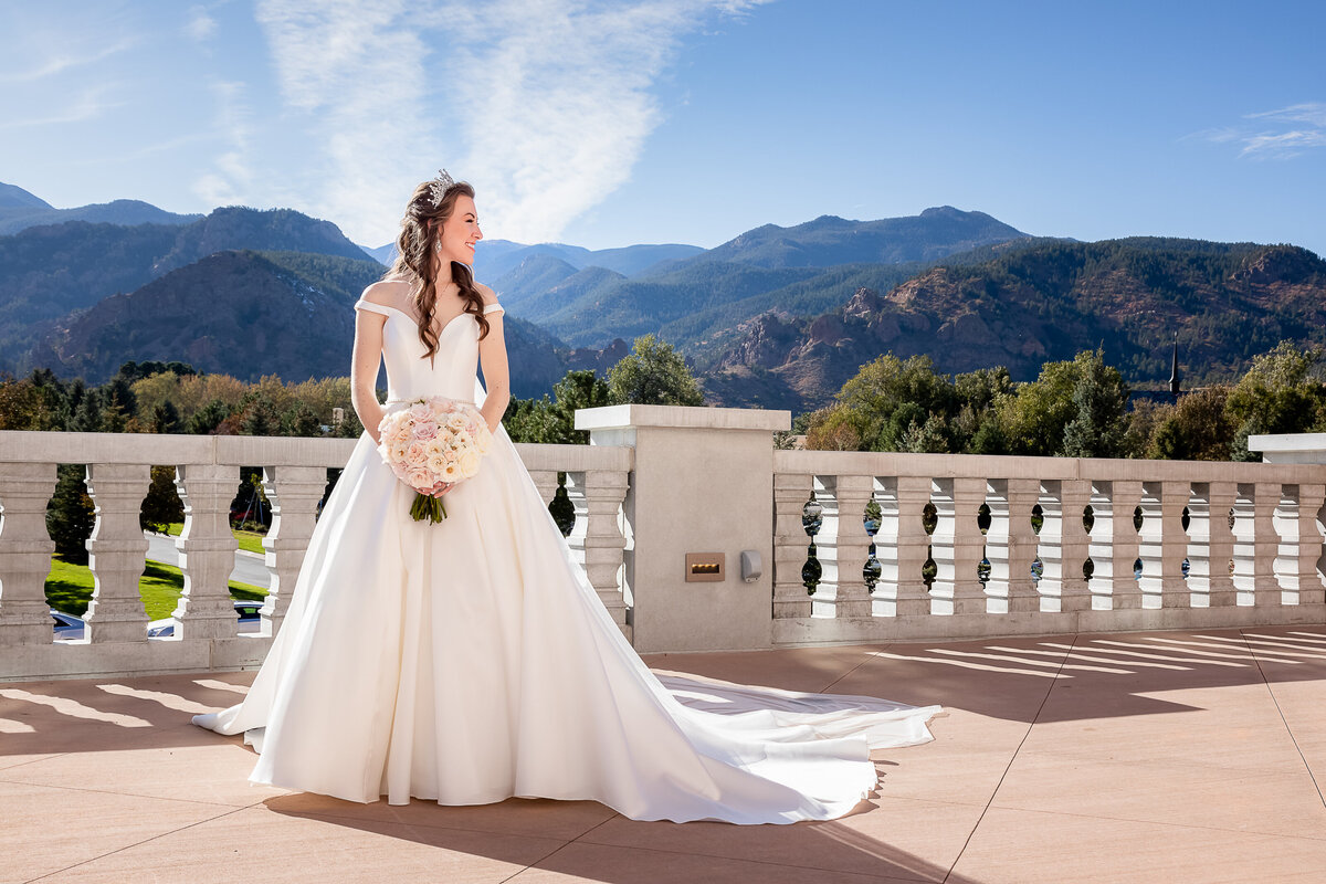 A Bride Poses for her Wedding Photos at the Broadmoor