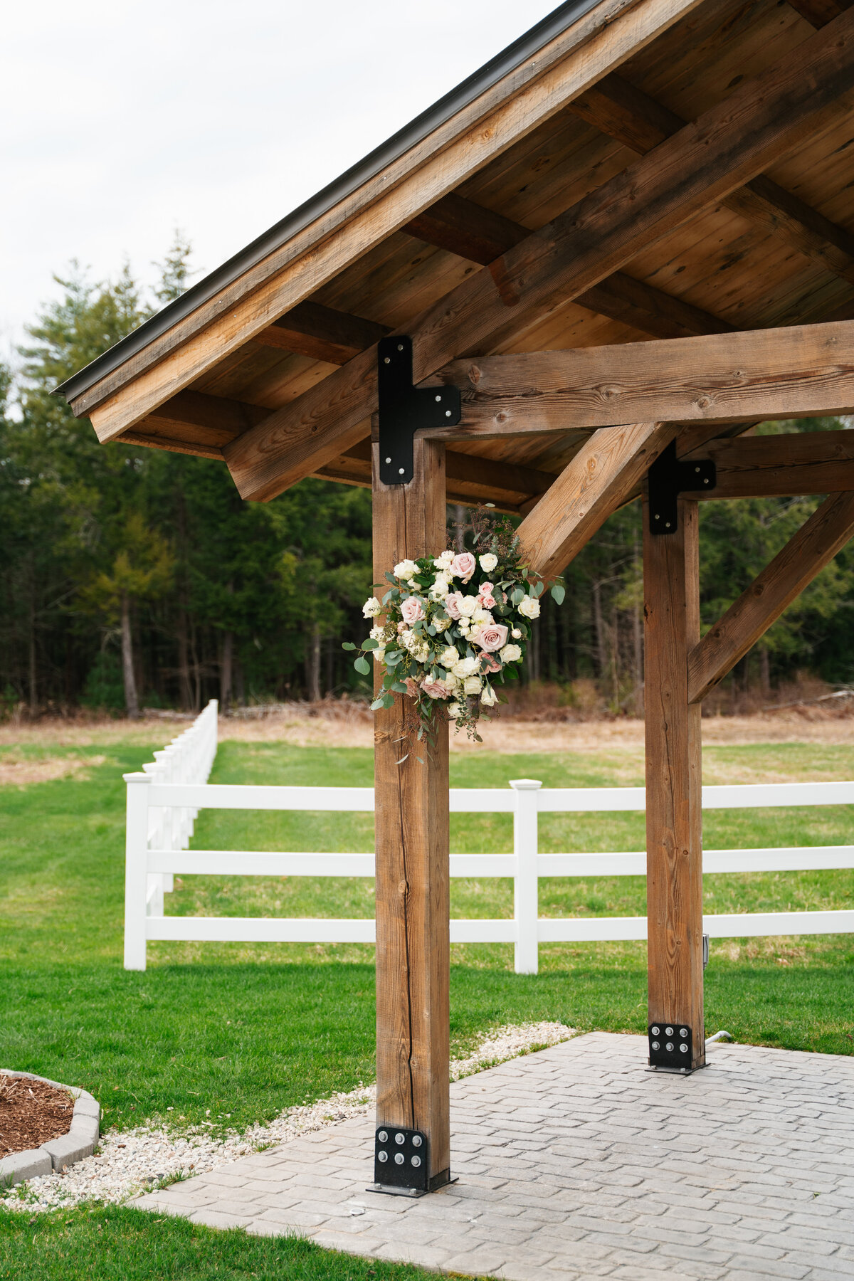 Rustic wedding details with greenery and neutral tones