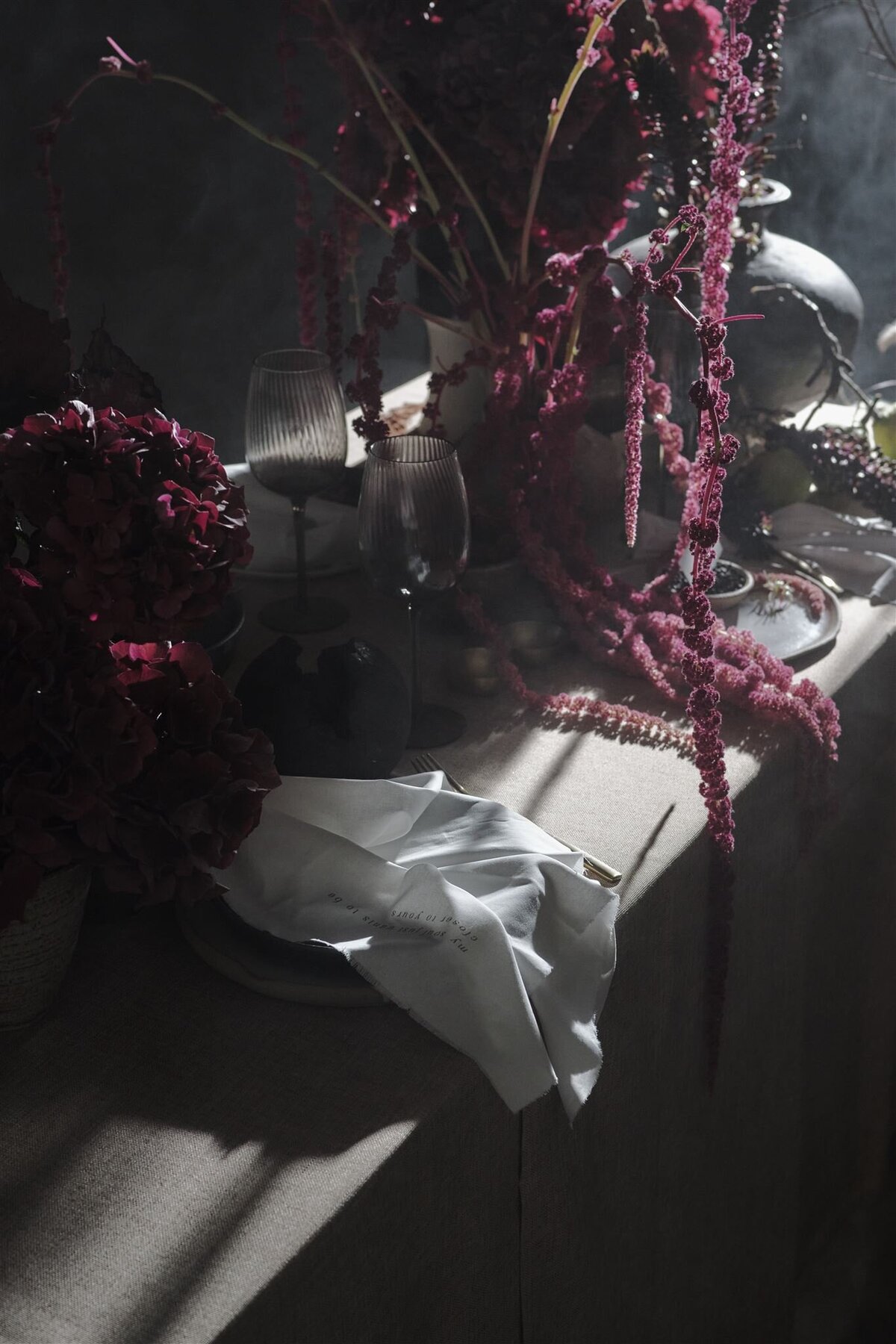 A table dripping with crimson amaranth and hydrangea by Melbourne florist tweedtwigs, styled by Ruffles and Bells.