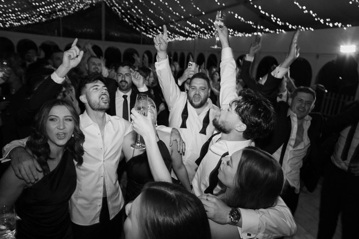 bride and groom on the dance floor during their wedding 