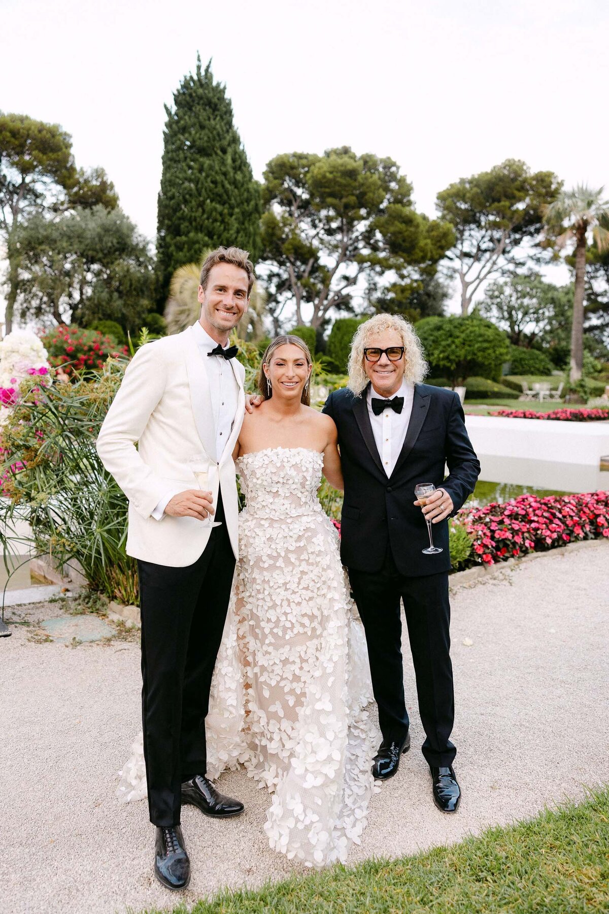 Bride and groom with David Bryan, member of Bon Jovi band.