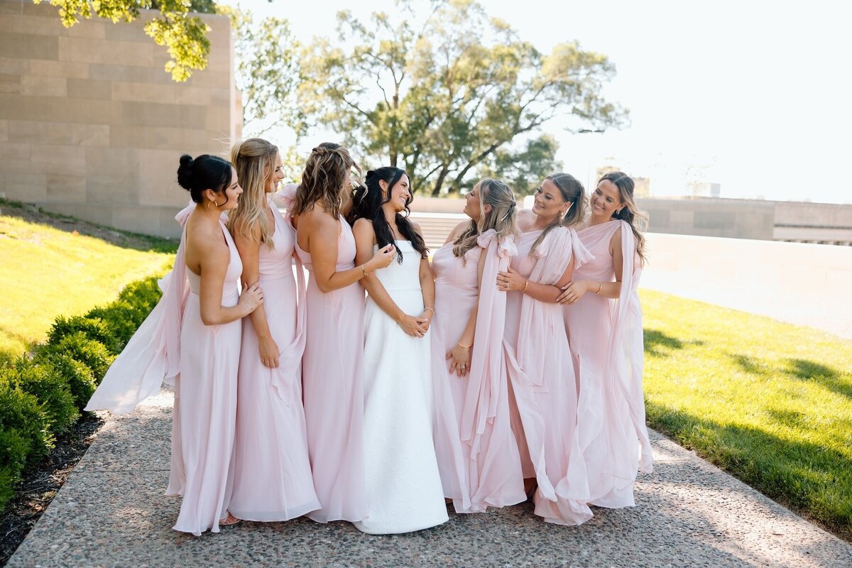 bridal party shares a laugh at wedding in kansas city 