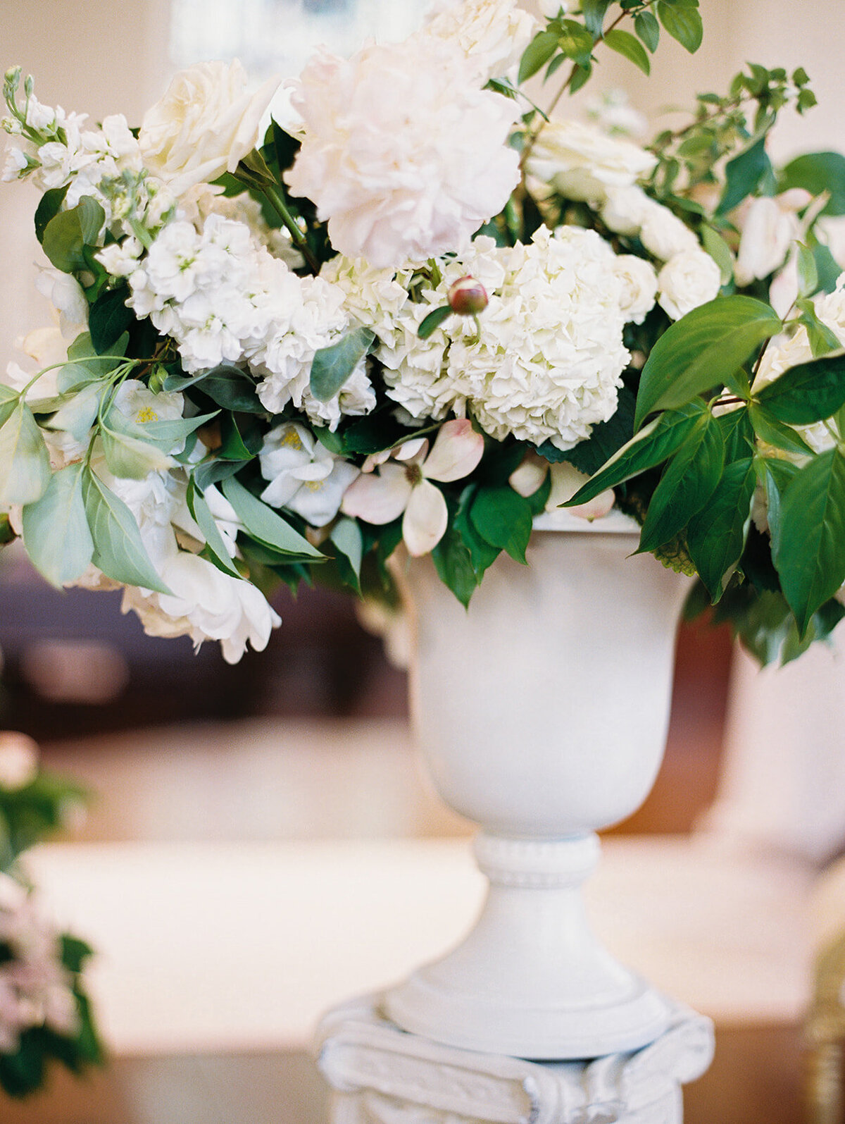 floral urn arrangement in white and green at Baltimore church