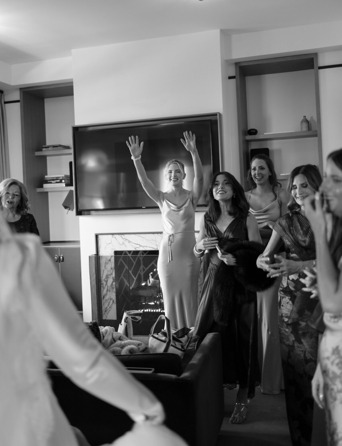 organic, candid wedding photography, bridesmaids cheer when seeing bride at Shinola Hotel