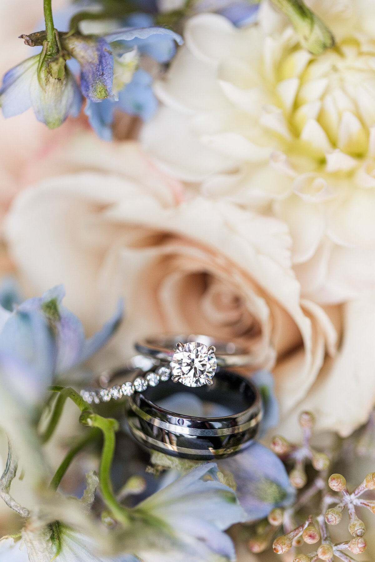 wedding bands on bridal bouquet