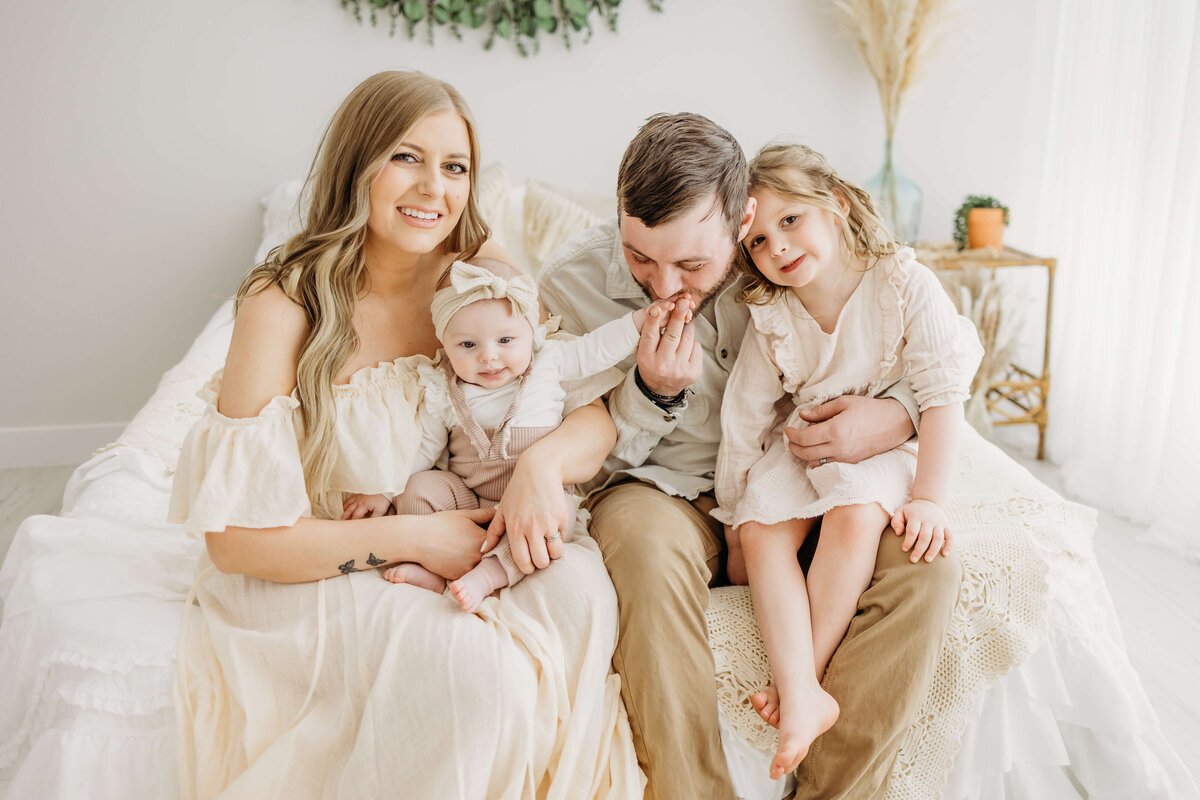 An Eau Claire family photography session in white and bright and airy photography studio