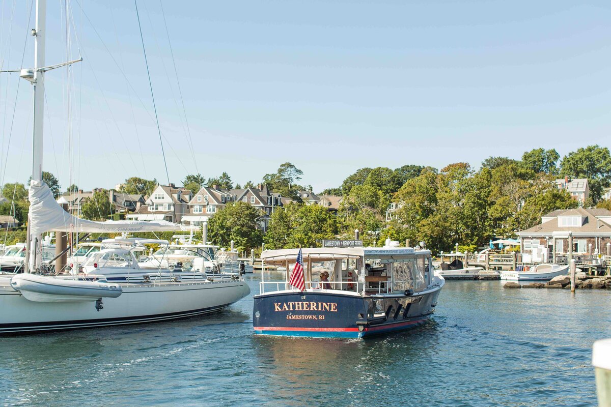 Scenic photo of boats and town in Jamestown, RI