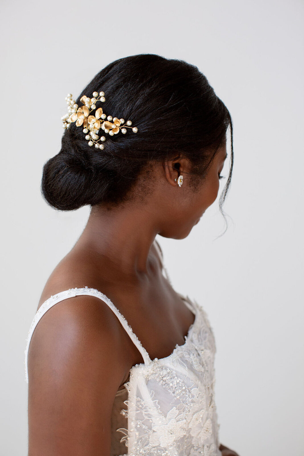 Elegant gold and pearl bridal hairpiece, by Joanna Bisley Designs, romantic and modern wedding jeweler based in Calgary, Alberta.  Featured on the Brontë Bride Vendor Guide.
