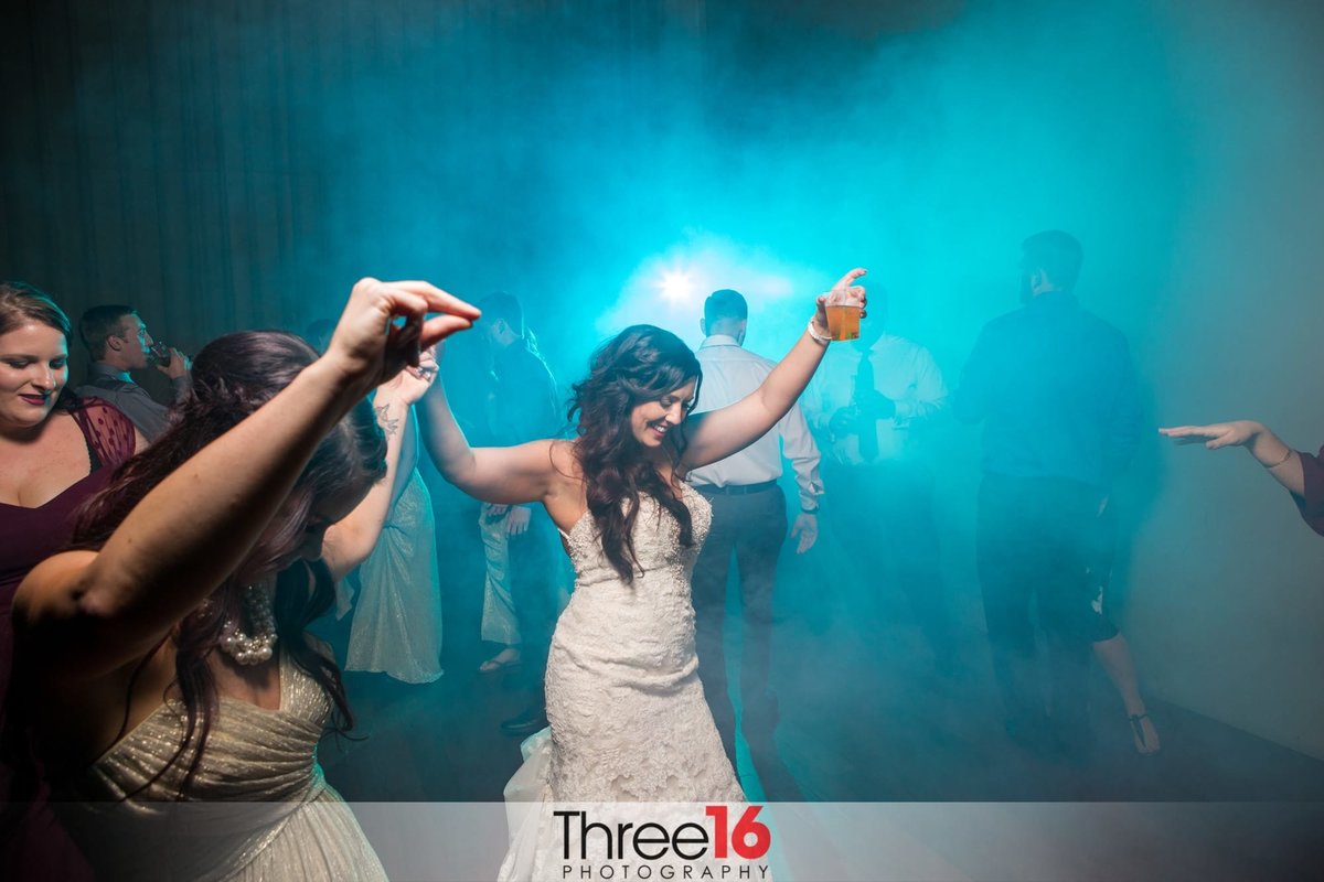 Bride dancing during her wedding reception