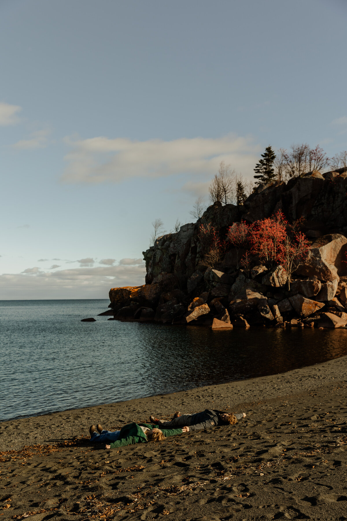 Unique Posing Couples Photos at the Black Sand Beach In Minnesota 