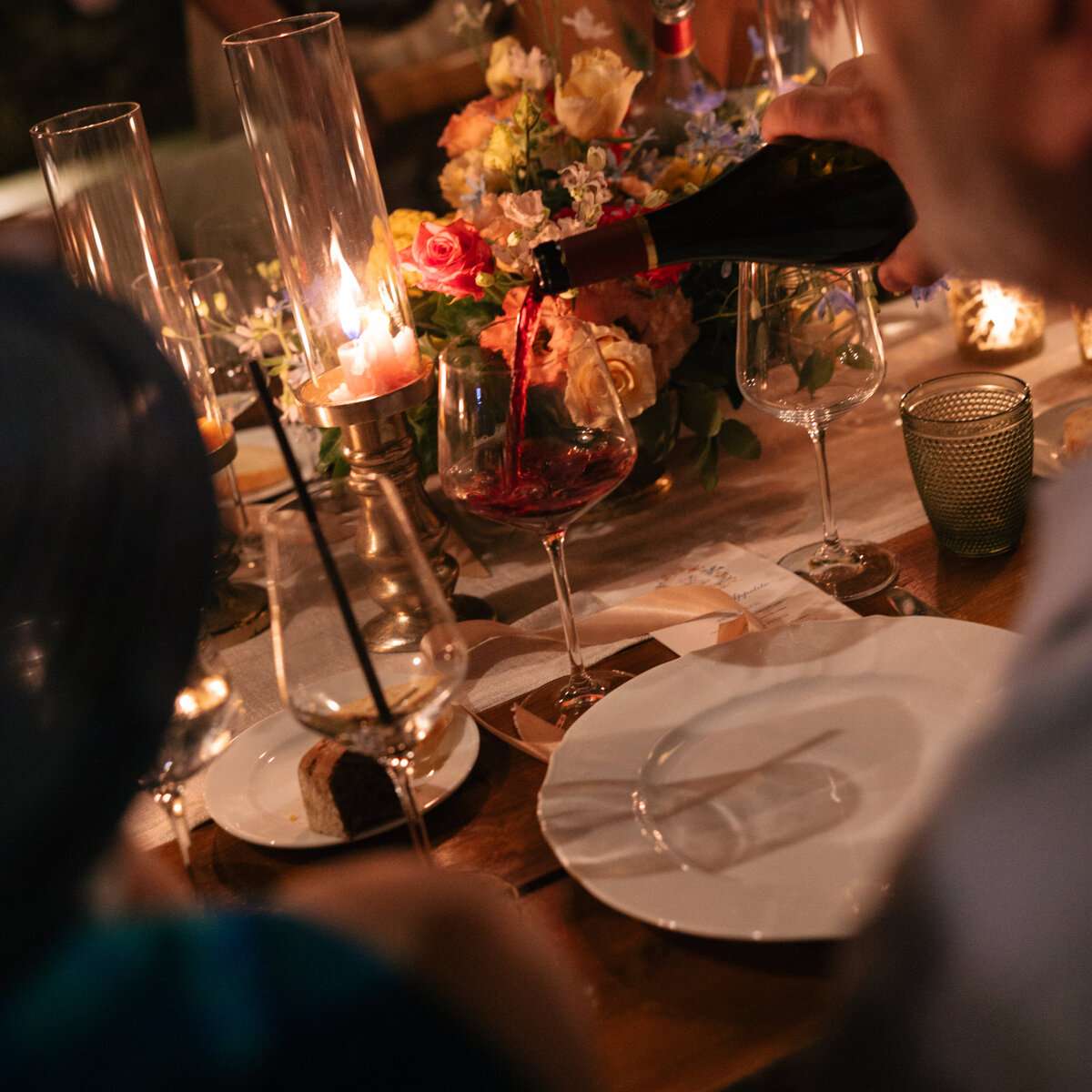 Red wine toast shared by family and friends during reception