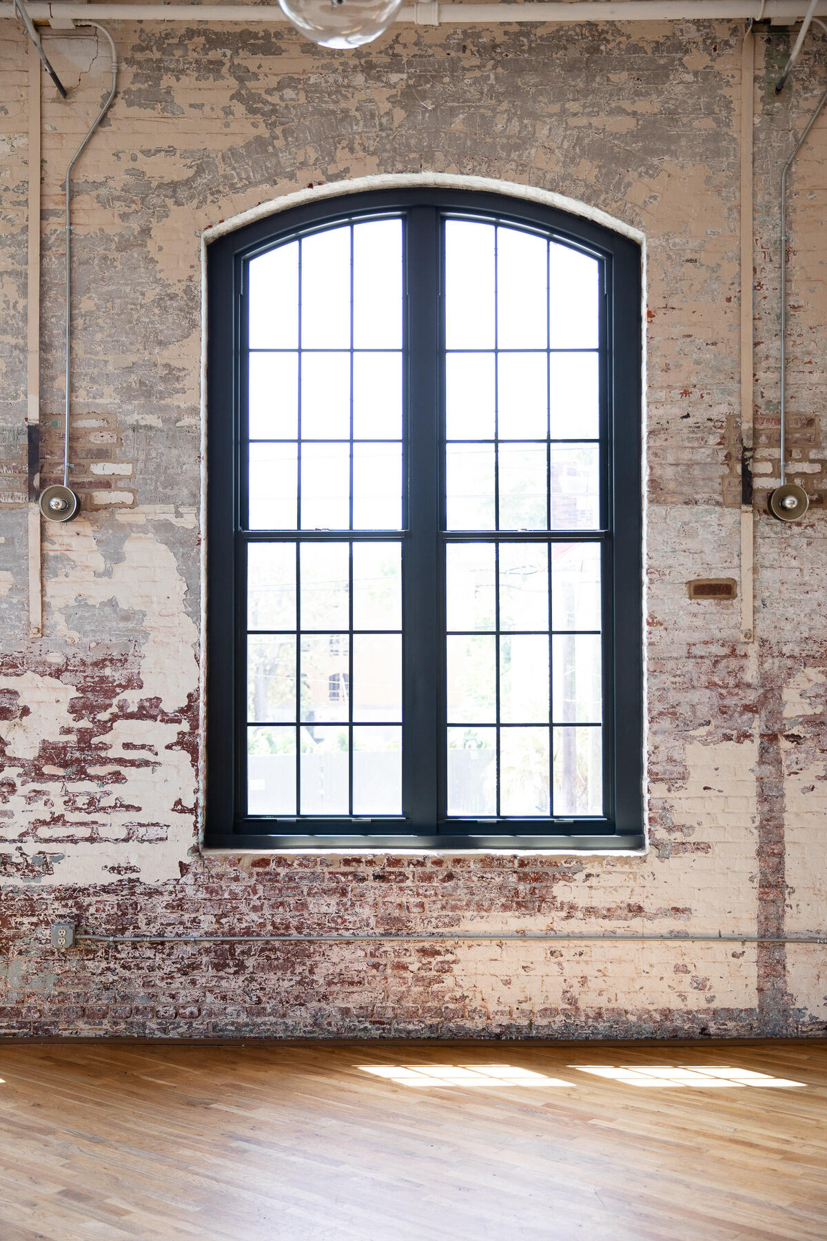 The Cedar Room Charleston high windows and natural light