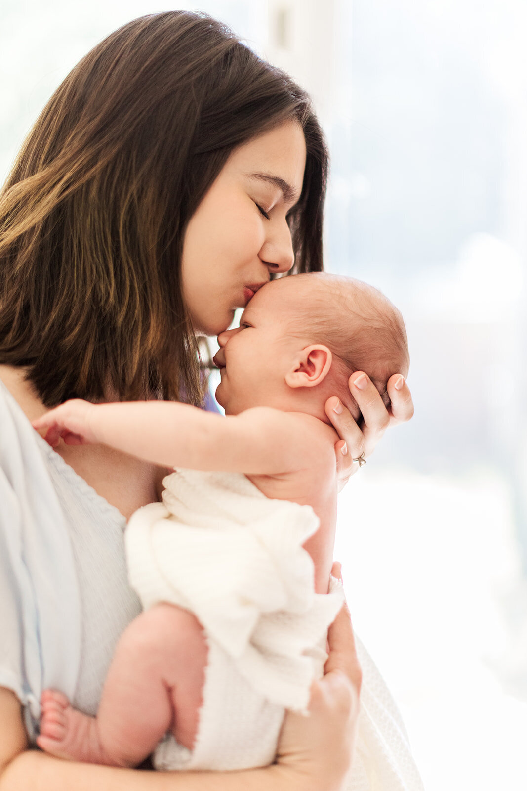 Newborn photographer in Statesville NC captures first days at home
