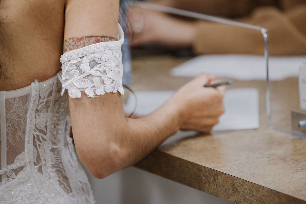 Laguna Hills Wedding, bride and groom signing