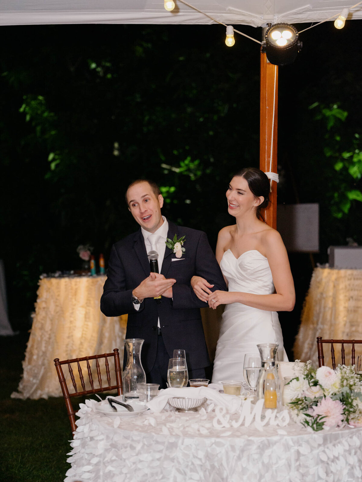 Elegant tented reception at private estate wedding.