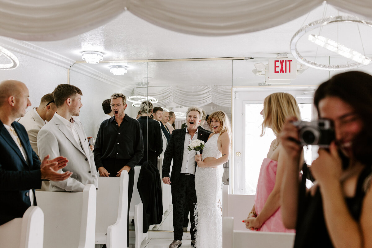 Family stands around and talks during an elopement.