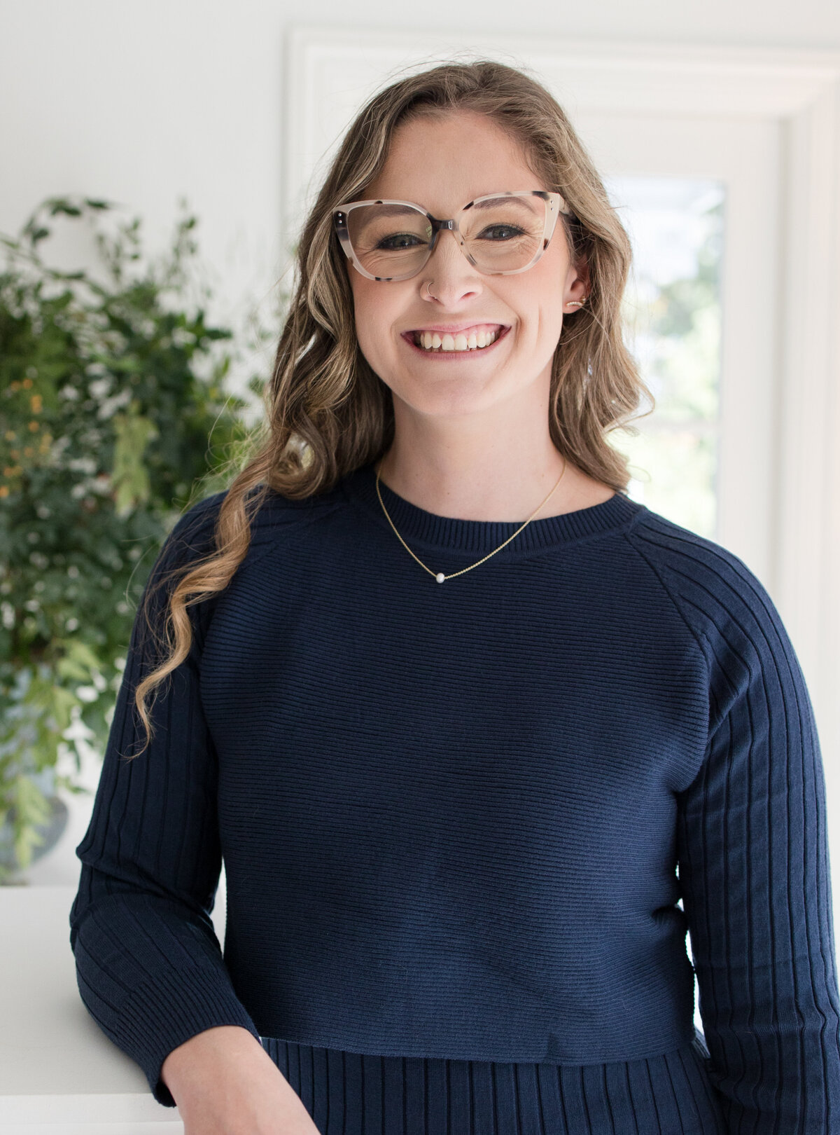 headshot for caitlin pederson at matt golley real estate group