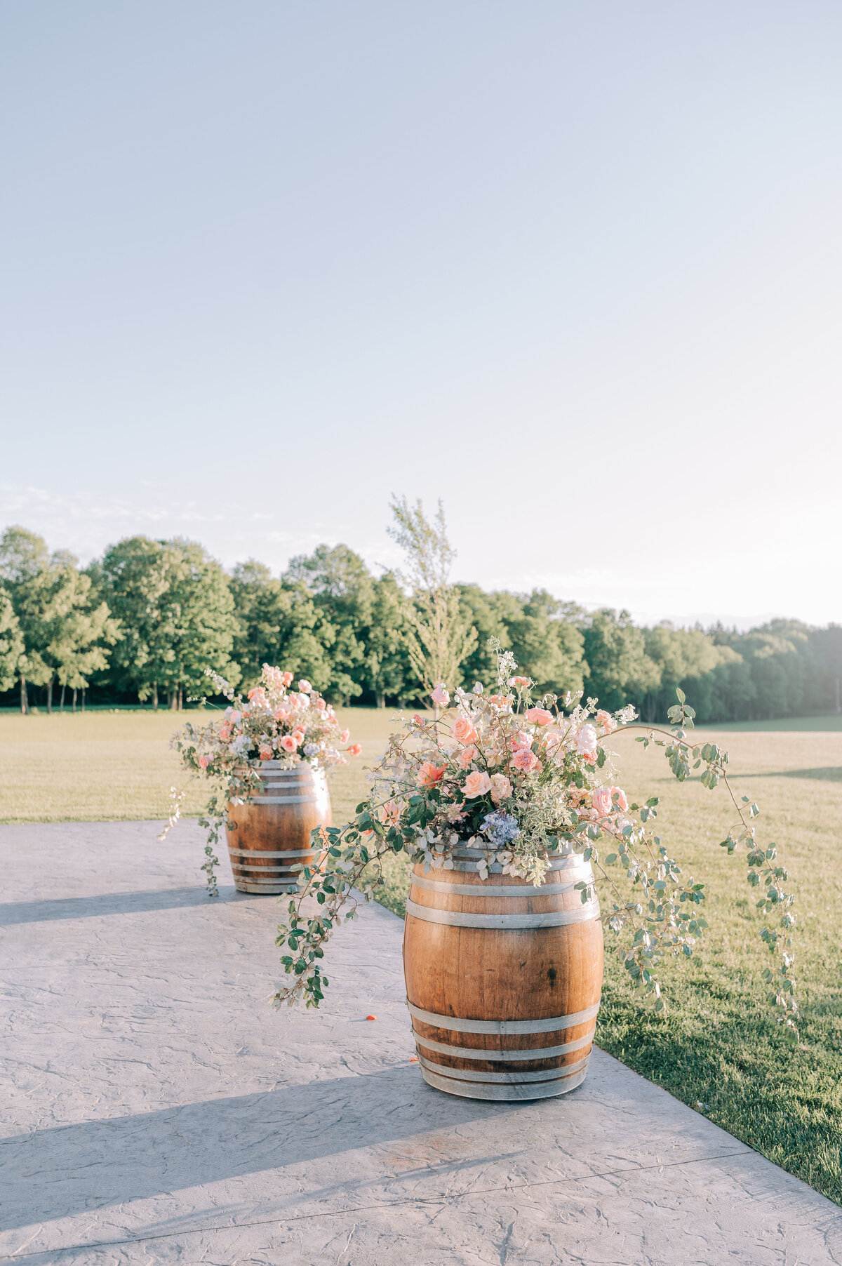 Tuckd Inn Farm Ceremony Wine Barrel Decor