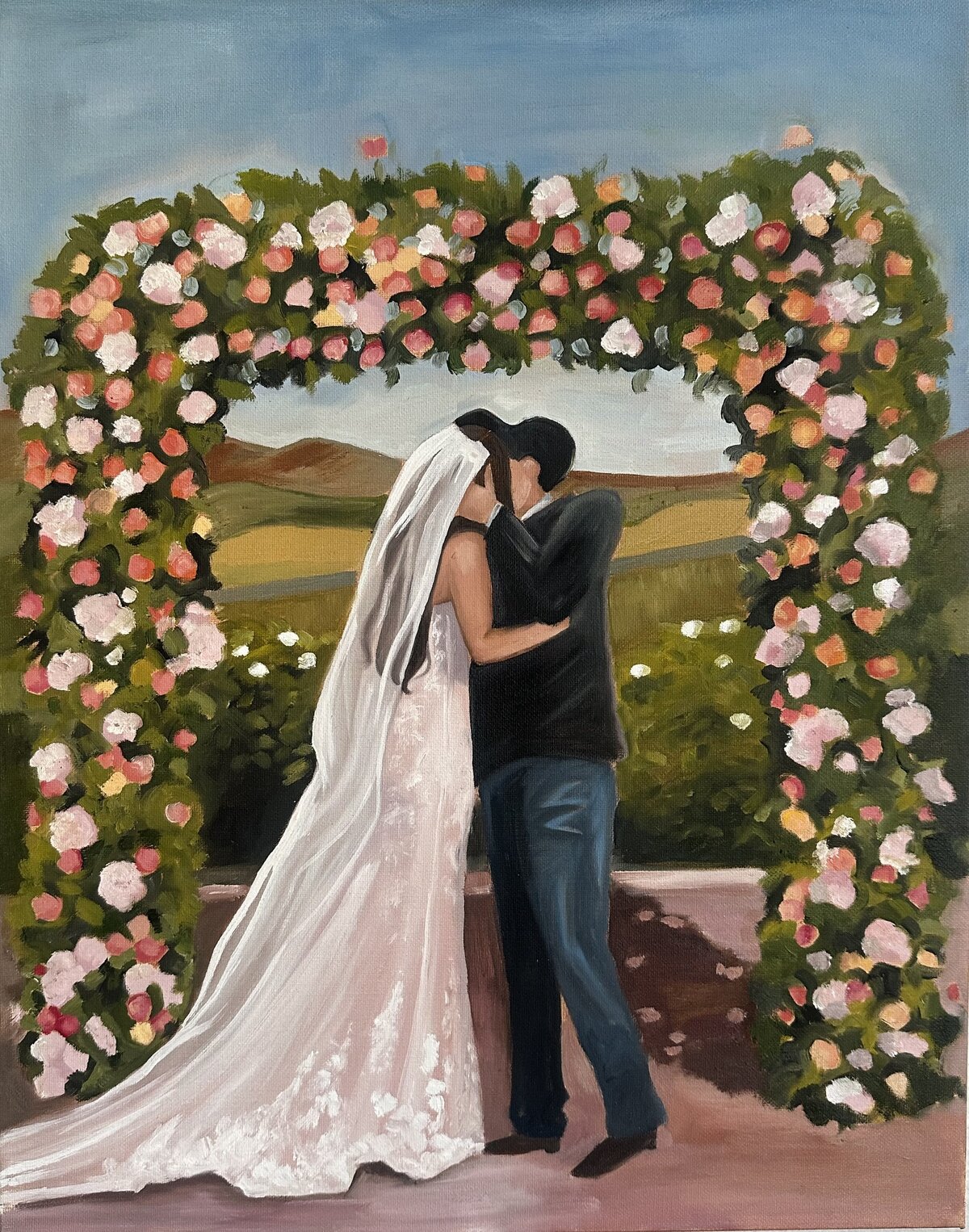 A couple shares their first kiss in this live wedding painting created at La Lomita Ranch 