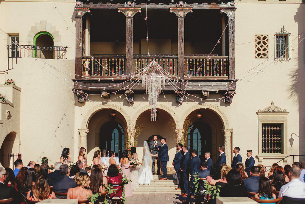 Romantic outside ceremony with floating chandelier