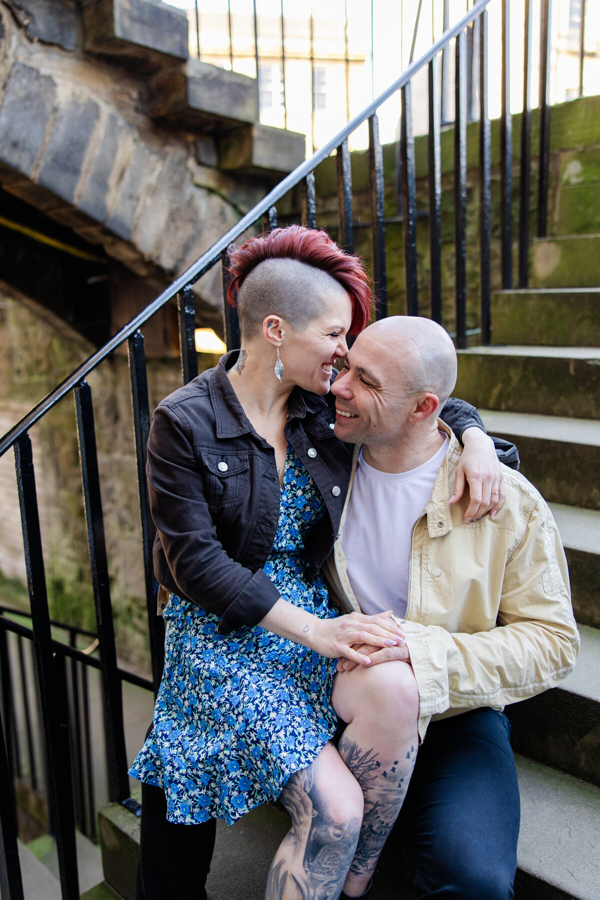 rocker couple kiss on steps in Stockbridge, photo by Love is Magic Photo