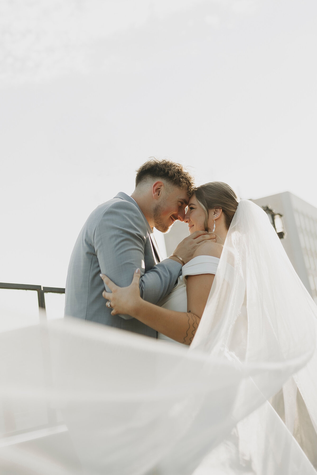 bride and groom nose to nose