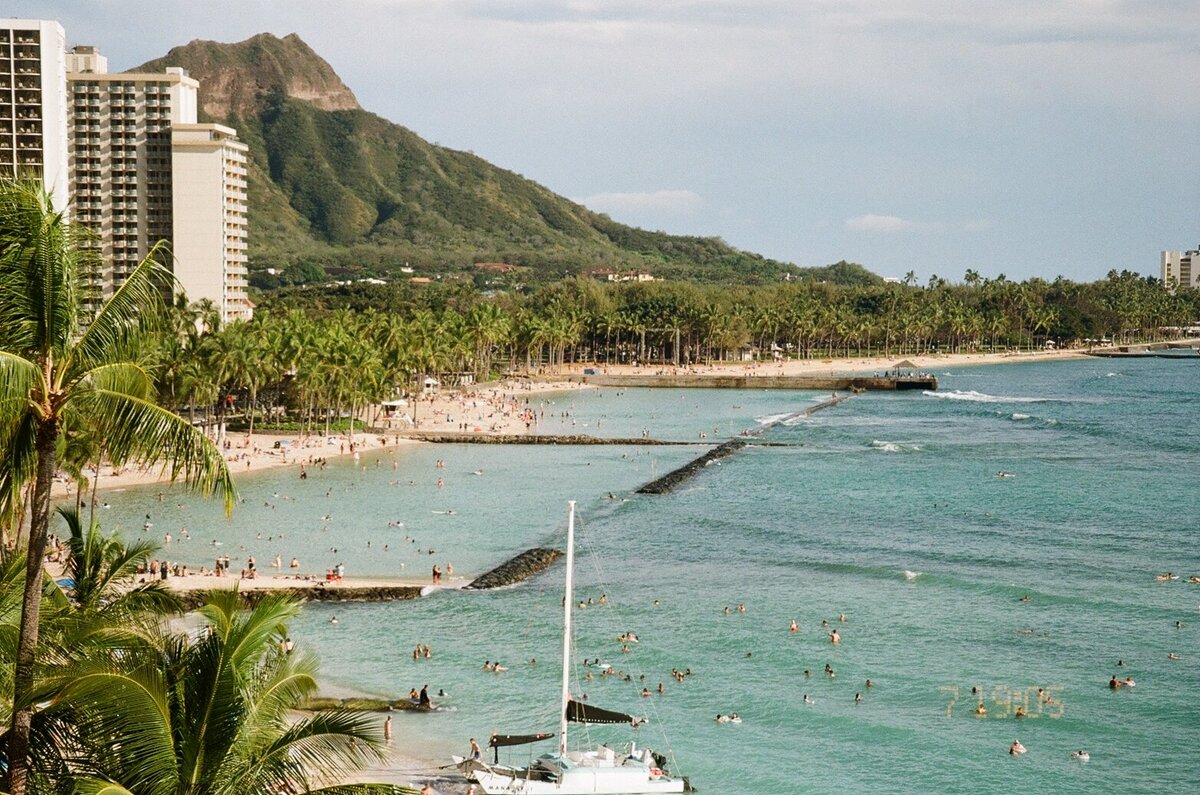 Diamond Head from a rooftop view captured on film by Kate Winters Photography, showcasing the iconic landscape of Hawaii in an authentic, documentary style.