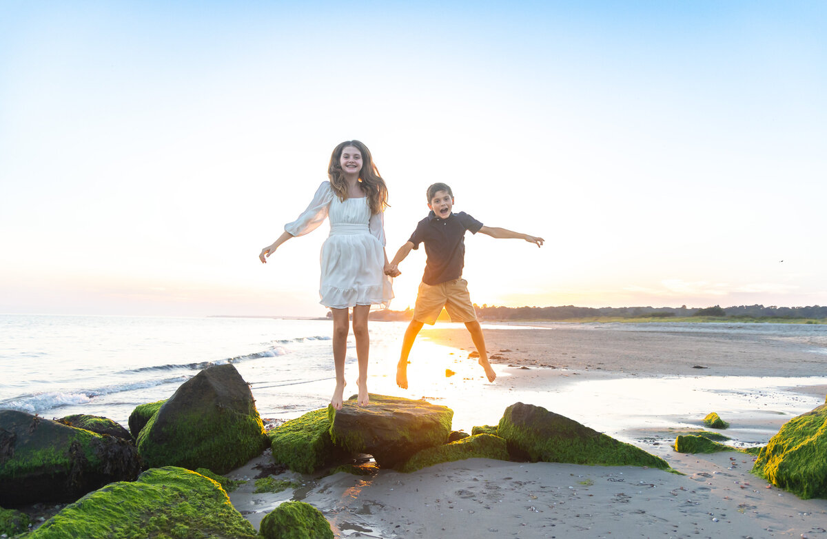 brother-sister-jumping-rocks-beach-fun.waterford-beach.jpg