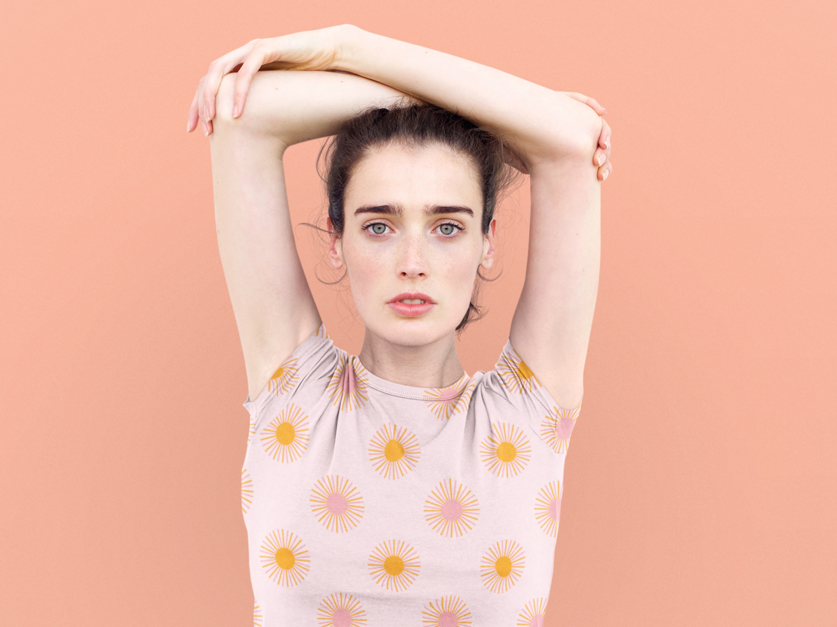 sublimated-t-shirt-mockup-of-a-woman-posing-with-her-arms-over-her-head-38792-r-el2