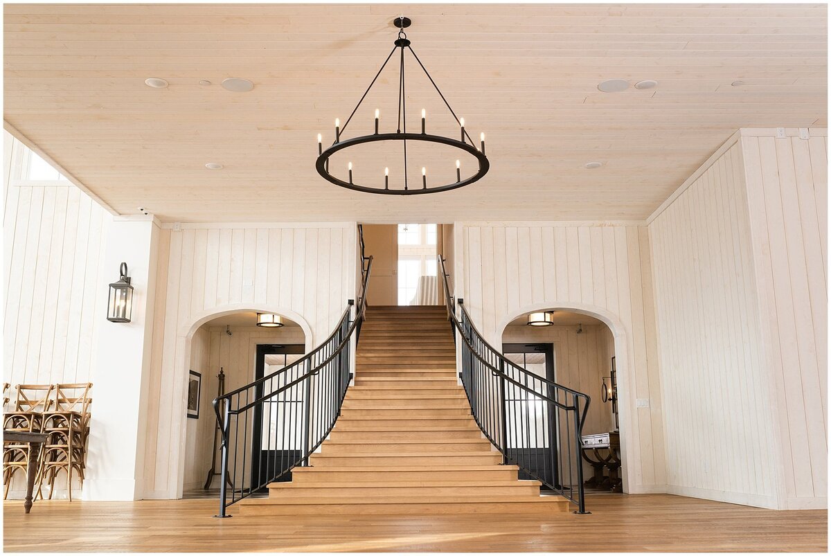 Staircase with modern farmhouse style at River Bottoms Ranch