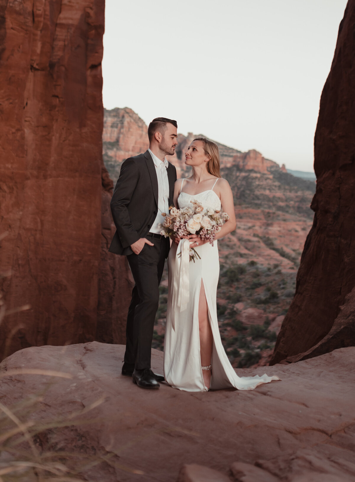 Sunset portrait of elopement couple on Cathedral Rock Sedona taken by Kollar Photography
