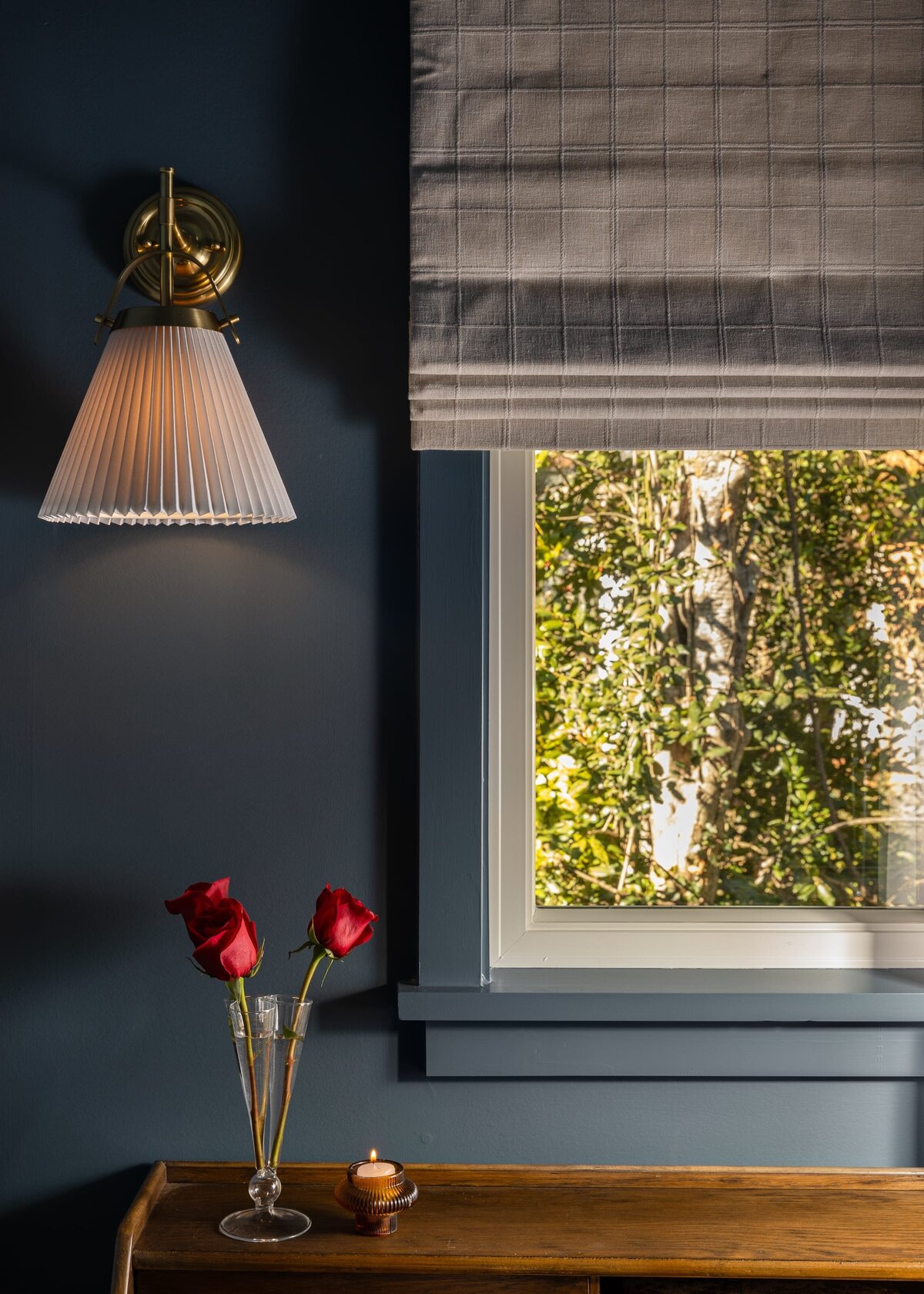 melinda chesson interiors murrayhill road window with red roses on wood table