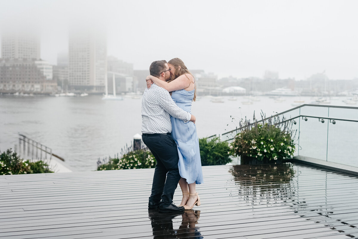 Promise of Forever: A tender moment captured in the engagement photos of a beaming couple, celebrating their love and commitment.