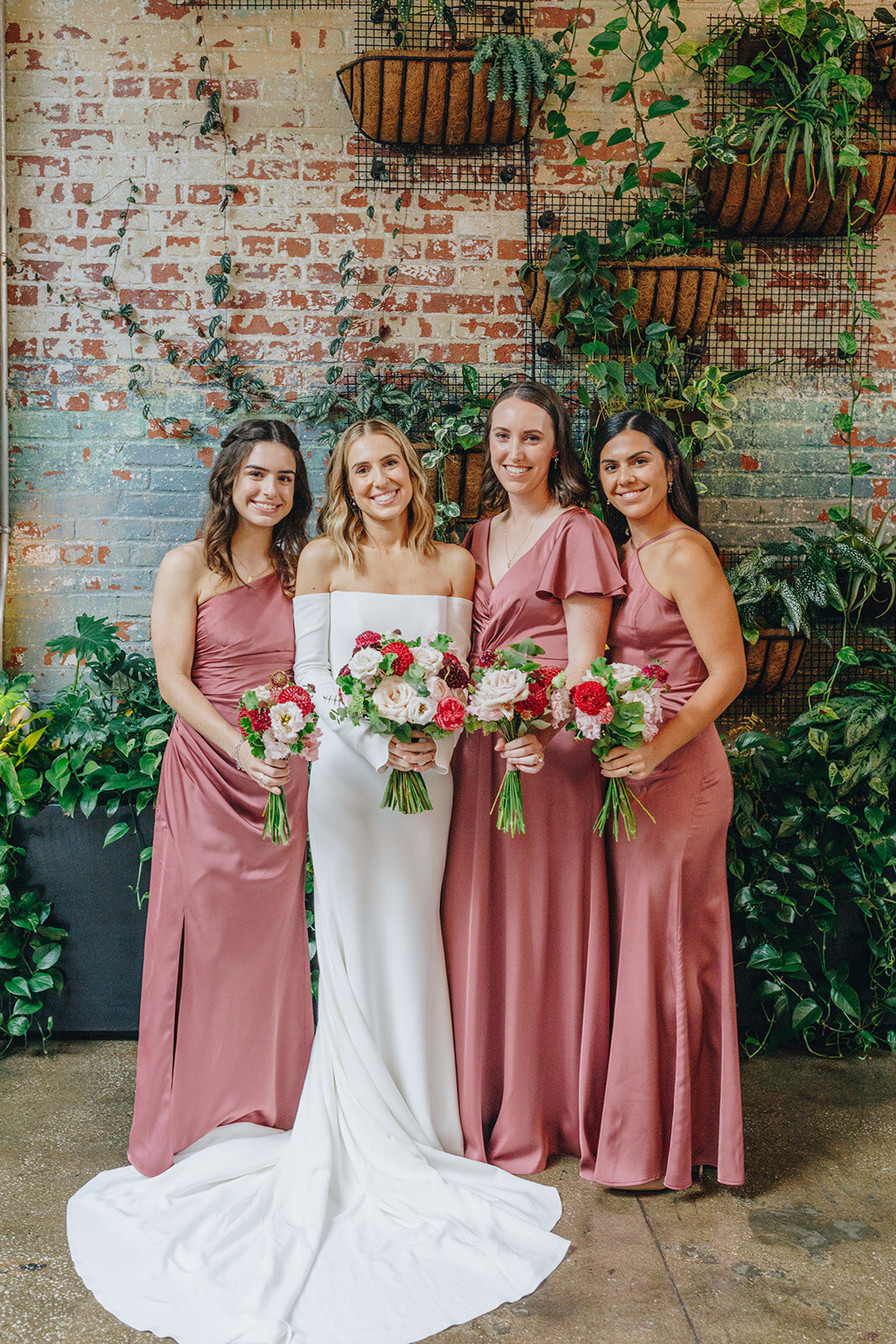 bride and bridesmaids portrait inside brooklyn winery 