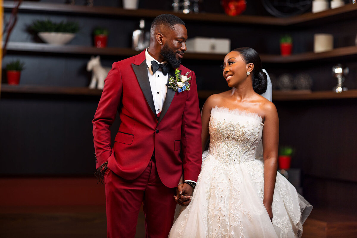 Tomi and Tolu Oruka Events Ziggy on the Lens photographer Wedding event planners Toronto planner African Nigerian Eyitayo Dada Dara Ayoola ottawa convention and event centre pocket flowers Navy blue groom suit ball gown black bride classy  67