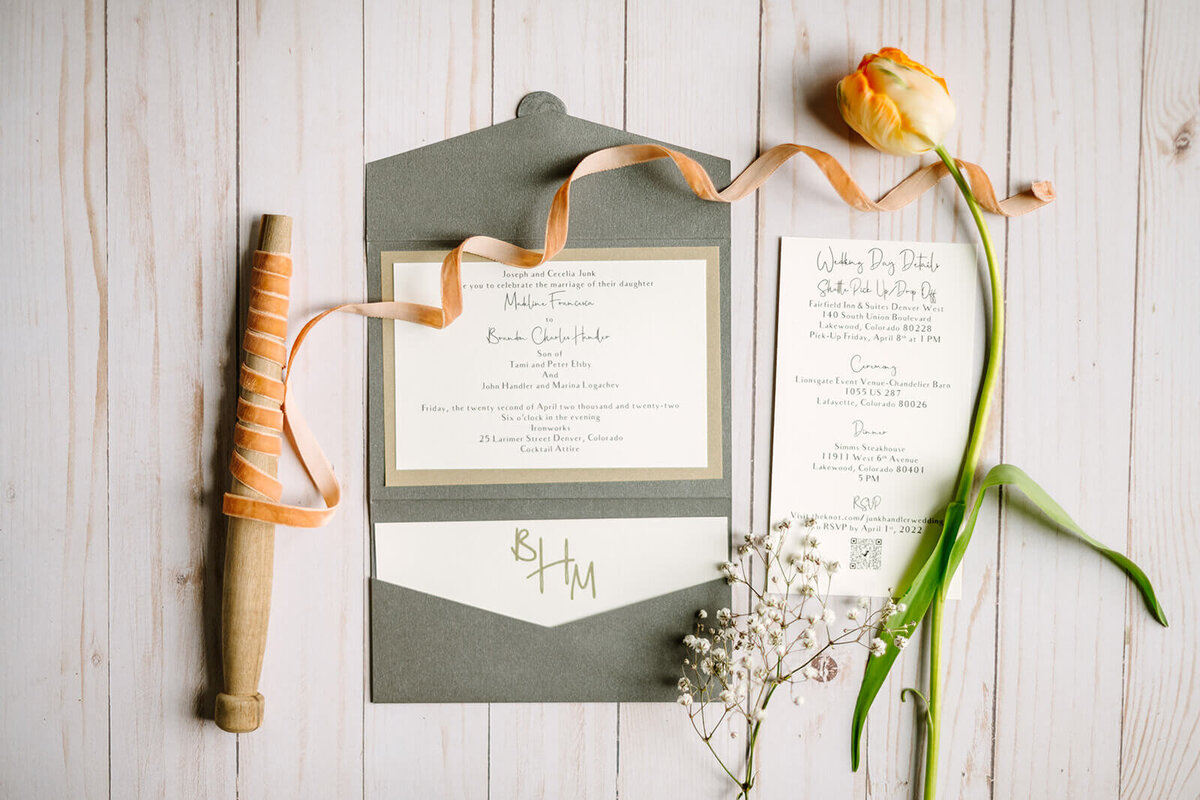 flat-lay-gunmetal-gold-invitation