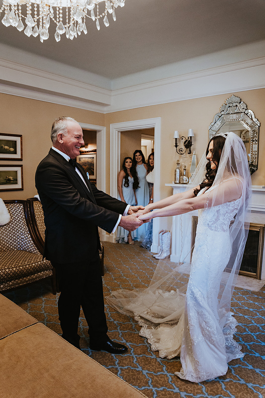 Bride and father share a special first look moment .