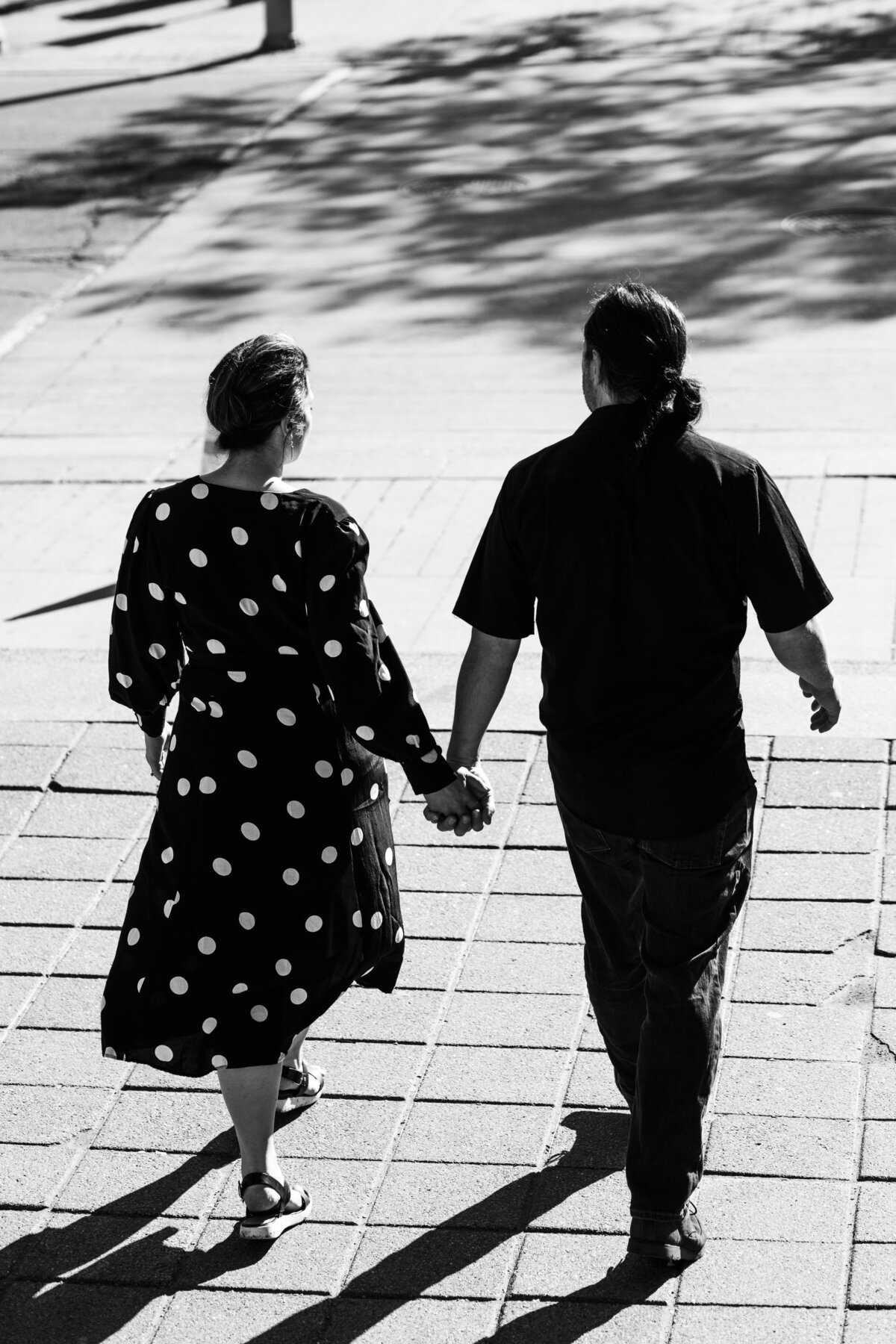 Couple walking together in the Byward Market, Ottawa