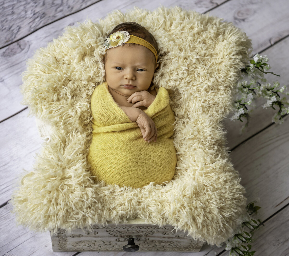 Baby in yellow with headband