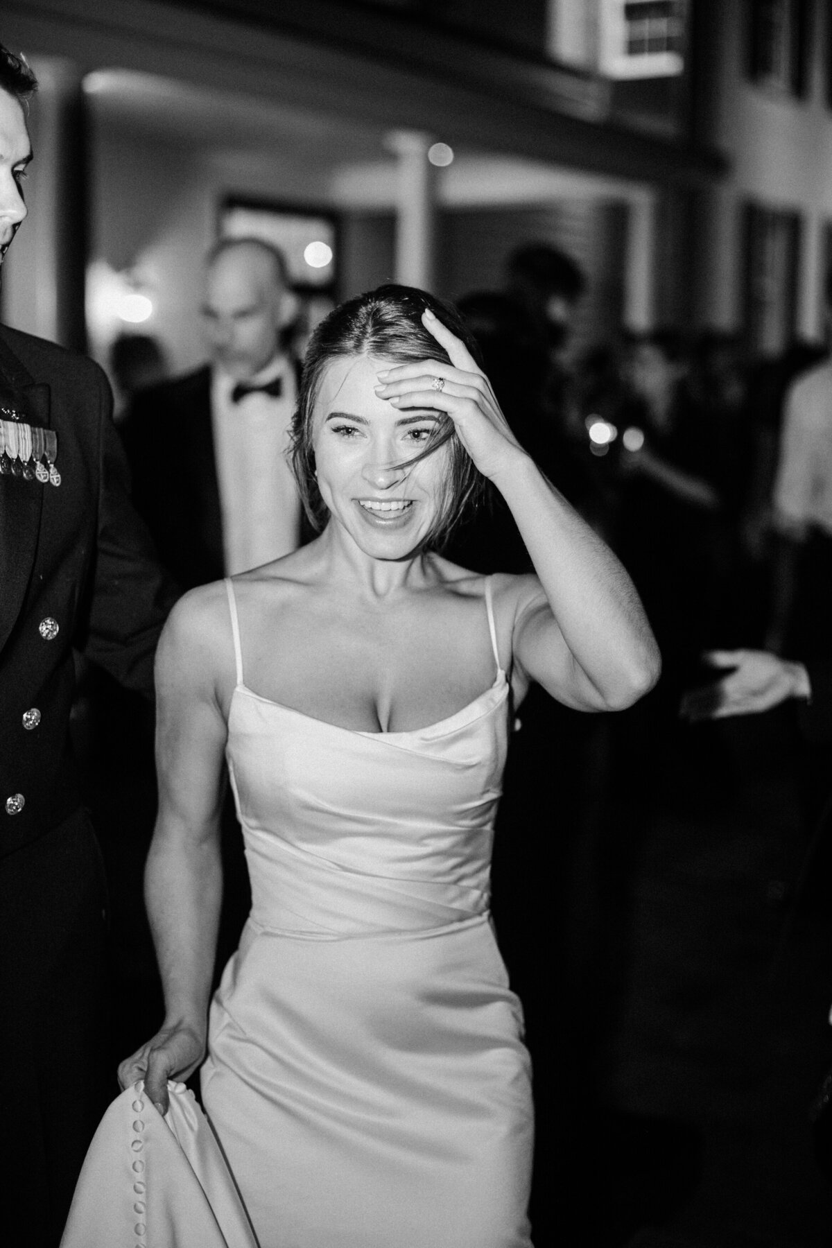 Candid black and white photos during wedding reception