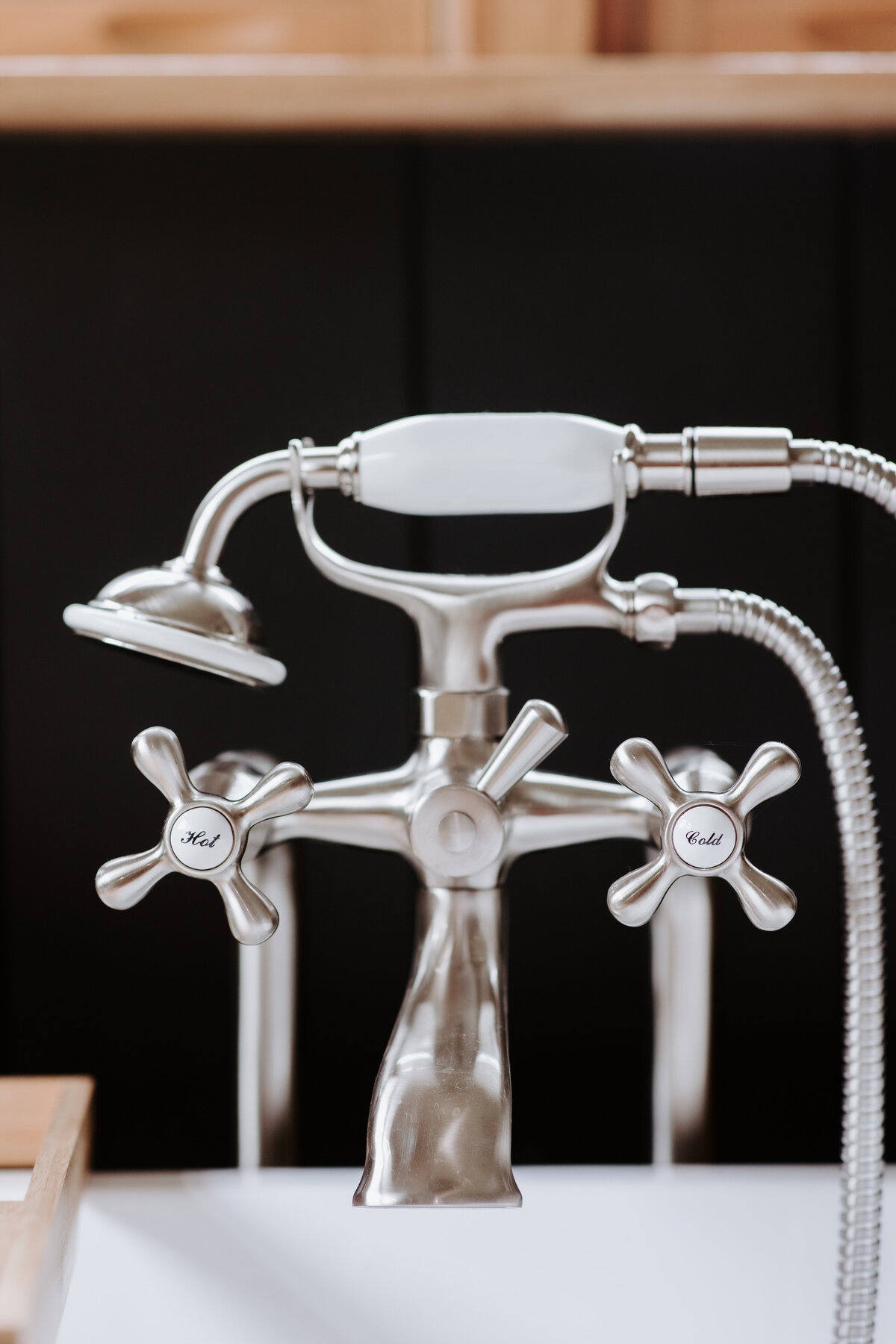 Kingston brass nickle faucet for a freestanding tub in the modern farmhouse overnight accommodations at Willowbrook wedding venue