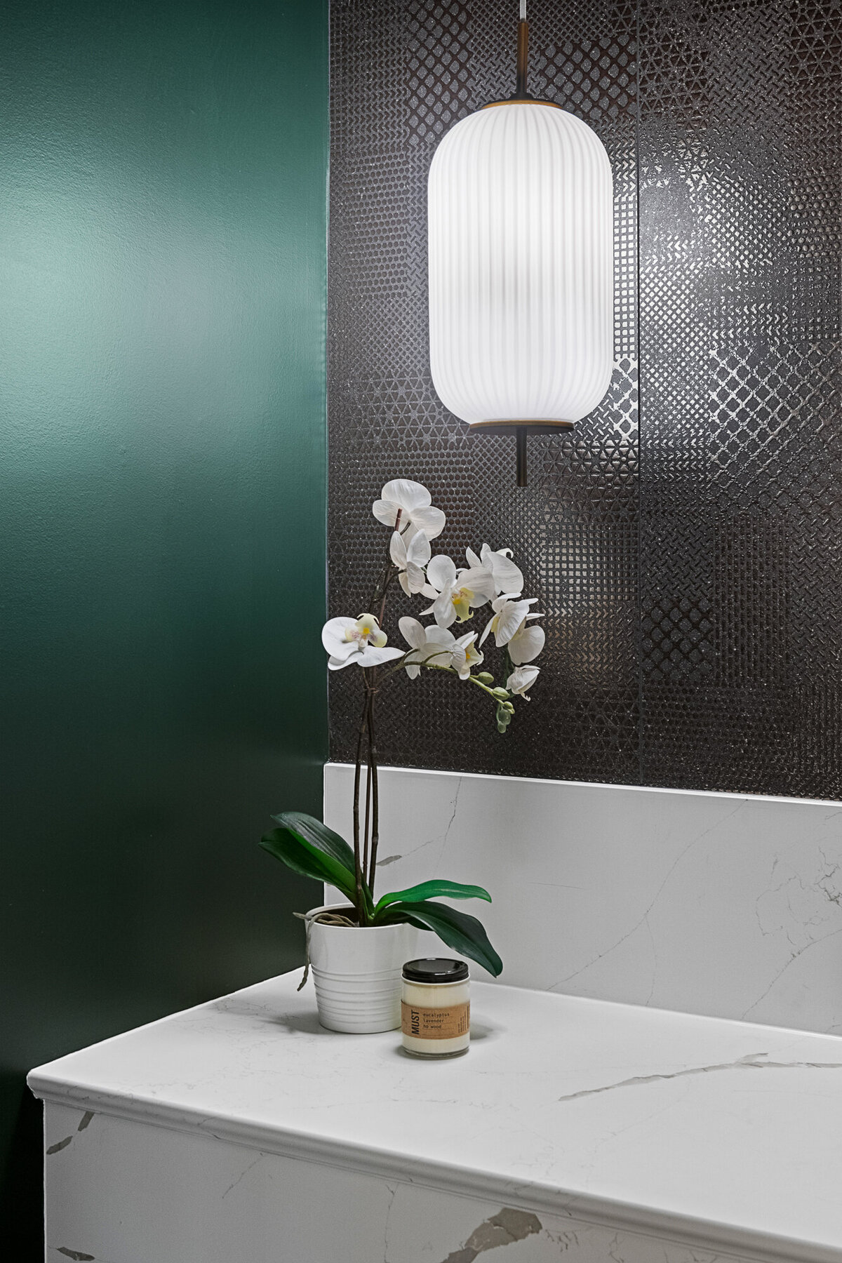 Final image of our moody luxe powder room interior design project.