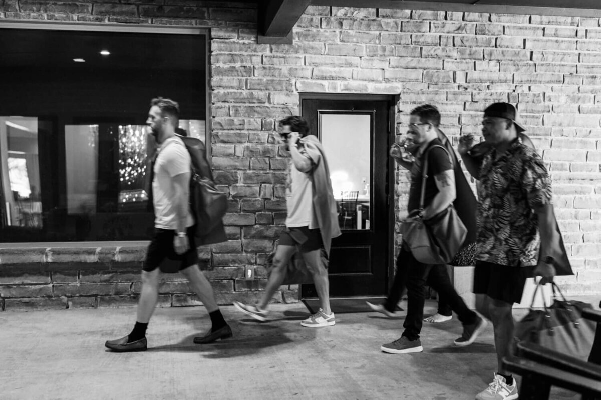game-day-entrance-groomsmen-motion-blur