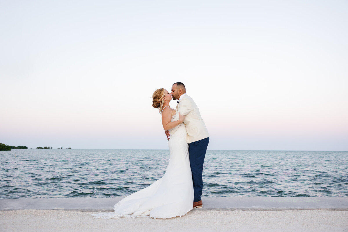 Kelly and Rafael sharing a sunset moment on the dock at La Siesta Marina.