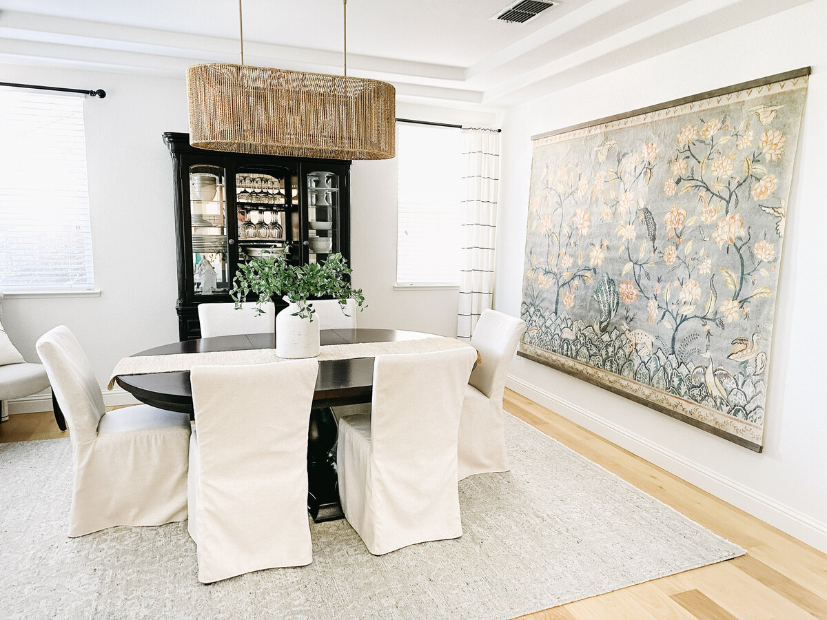 Dining room with tapestry