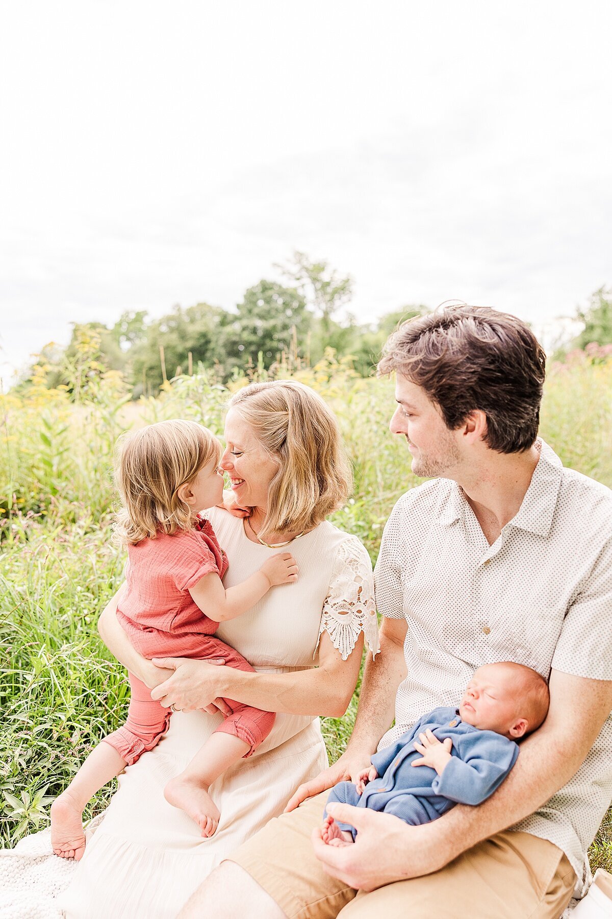 Outside  Newborn Photo Session with Sara Sniderman Photography  at Heard Farm Conservation Land, Wayland Massachusetts