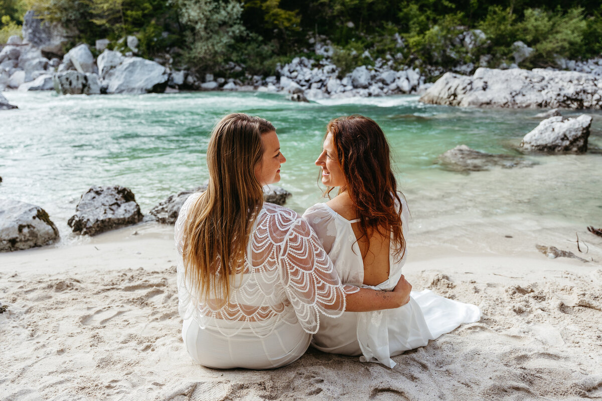 romantic couple in sand Soča Valley